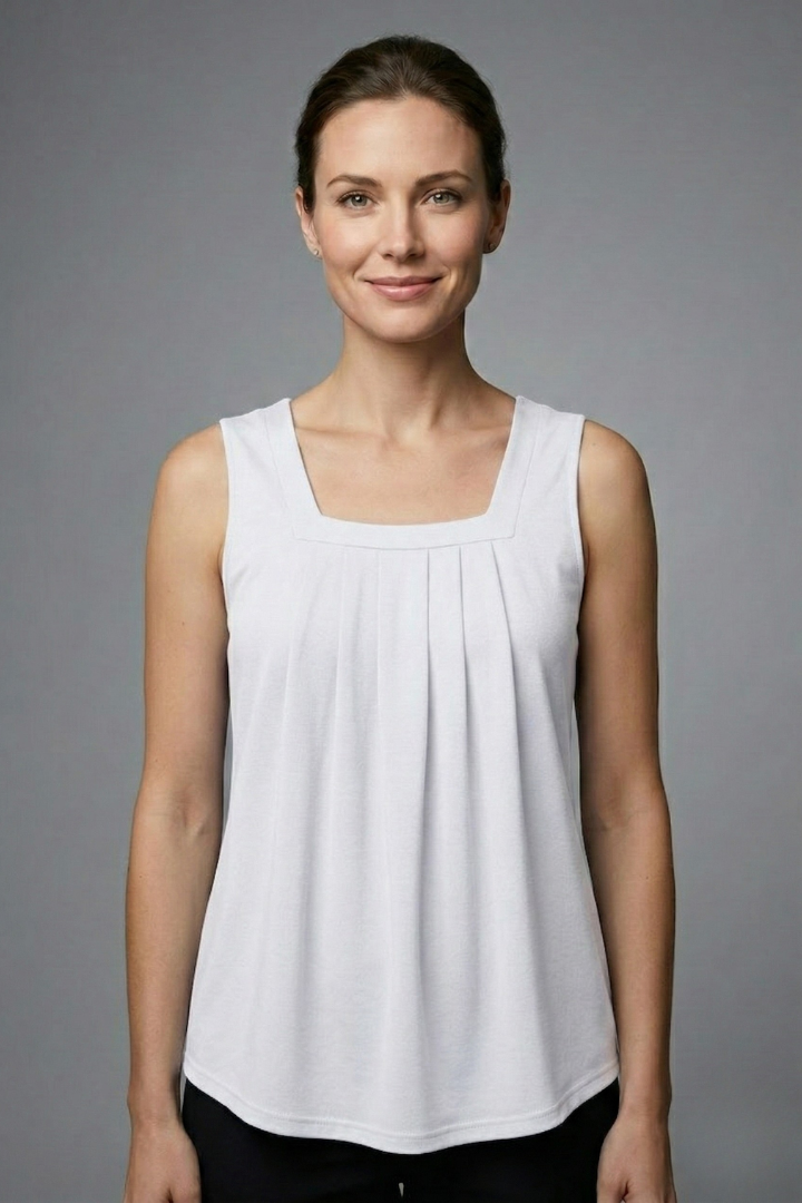 Women’s sleeveless blouse with square neckline, wide straps, rounded hem, and printed pattern, suitable for casual wear and summer outfits.