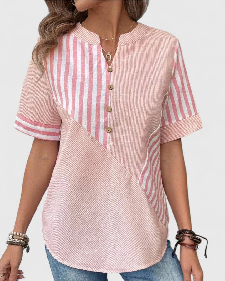 Women’s striped blouse with relaxed fit and classic design, ideal for office wear, casual outings, and everyday styling.