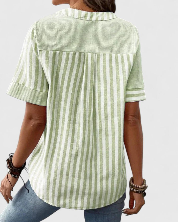 Women’s striped blouse with relaxed fit and classic design, ideal for office wear, casual outings, and everyday styling.