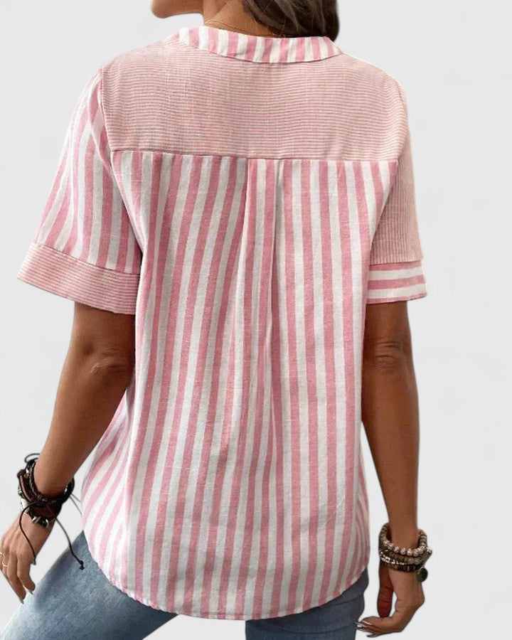 Women’s striped blouse with relaxed fit and classic design, ideal for office wear, casual outings, and everyday styling.