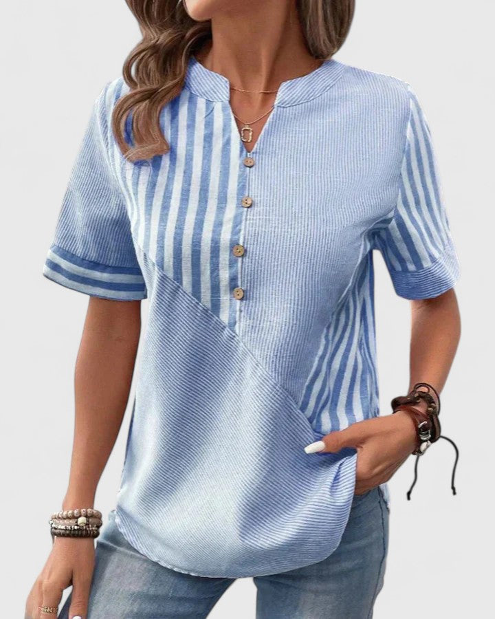 Women’s striped blouse with relaxed fit and classic design, ideal for office wear, casual outings, and everyday styling.