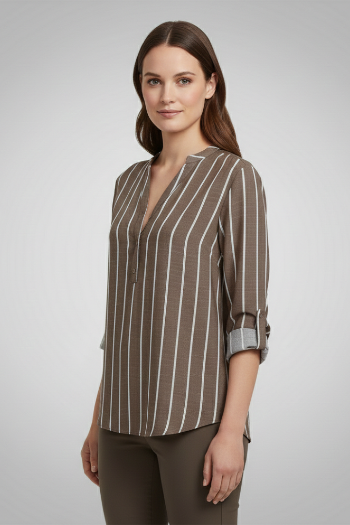 Women’s striped blouse with V-neckline and full button front, featuring roll-up sleeves and a curved hem for office or casual wear.