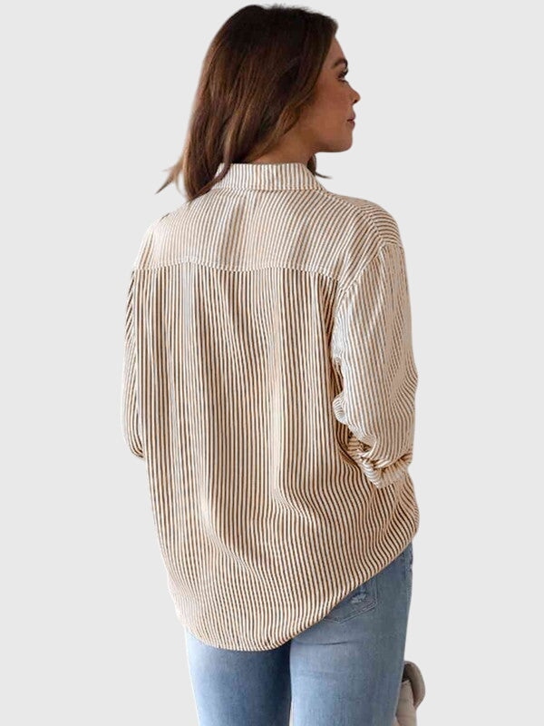 Women’s striped shirt with a collared neckline, button closure, and tailored fit, ideal for office wear, casual outings, and smart-casual occasions.
