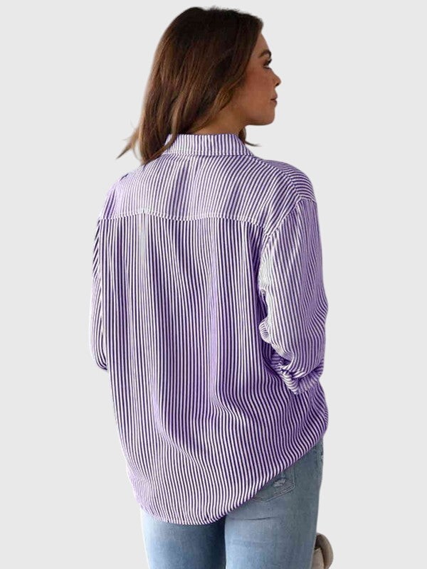 Women’s striped shirt with a collared neckline, button closure, and tailored fit, ideal for office wear, casual outings, and smart-casual occasions.