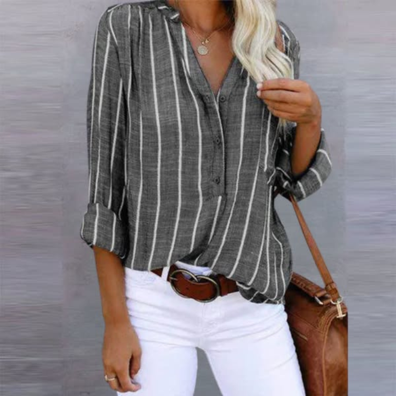 Women’s striped top with button-front closure, long sleeves, and relaxed fit, suitable for casual outings, workdays, and everyday styling.