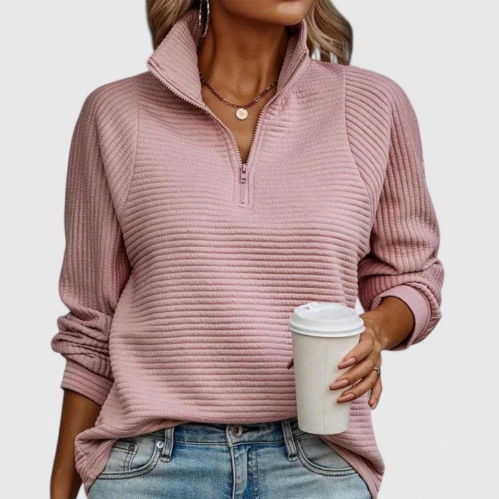 Women’s sweater with a relaxed fit and timeless design, ideal for casual wear, office outfits, and smart-casual occasions.