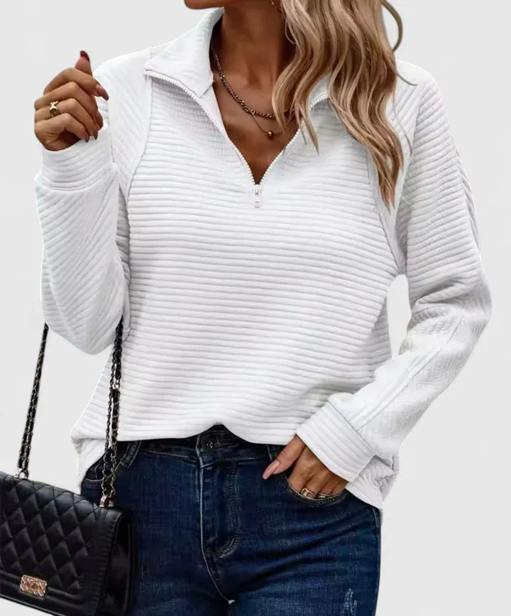 Women’s sweater with a relaxed fit and timeless design, ideal for casual wear, office outfits, and smart-casual occasions.