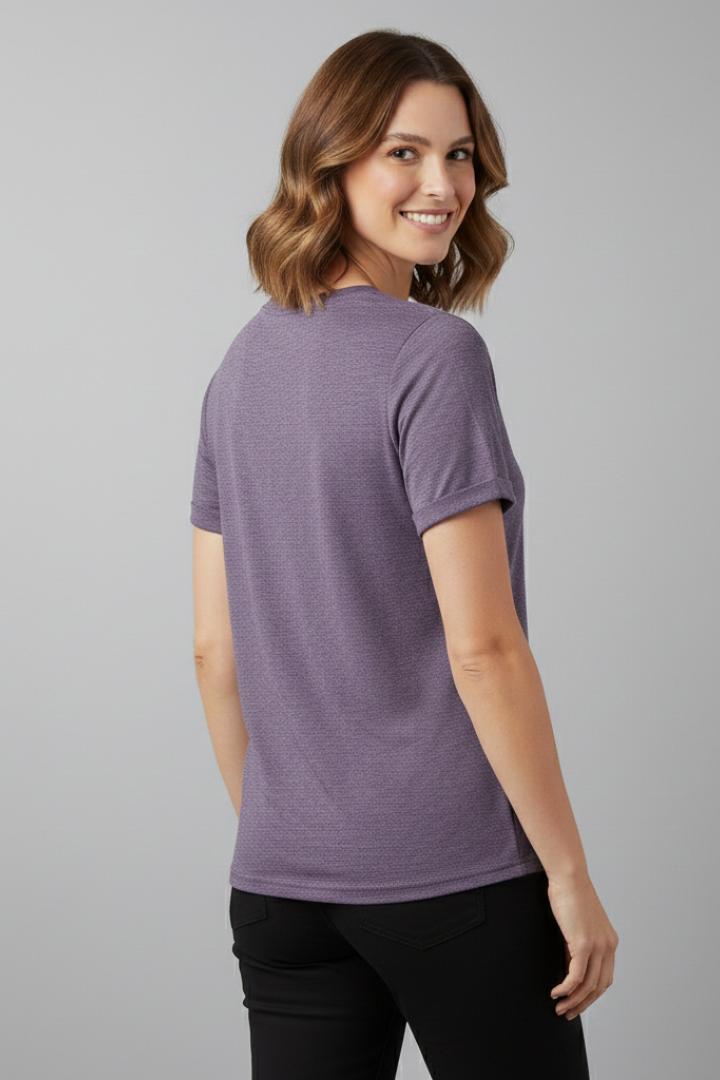 Women’s loose-fit T-shirt with round neckline, front button placket, and curved hem, suitable for casual wear and everyday styling.