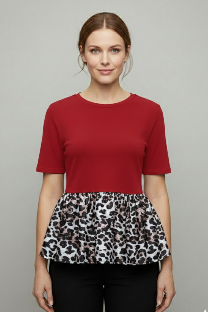 Women’s short sleeve T-shirt with round neckline and printed peplum hem detail, suitable for everyday wear and casual styling.