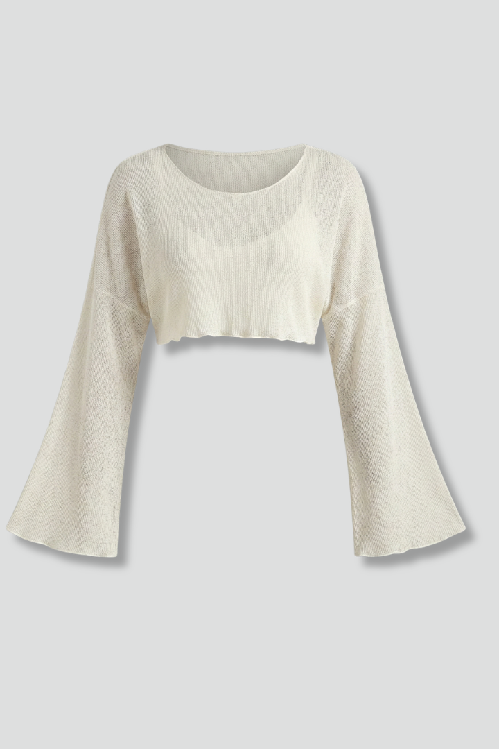 Women’s textured crop top with round neckline and long sleeves, ideal for casual everyday outfits and seasonal fashion styling.