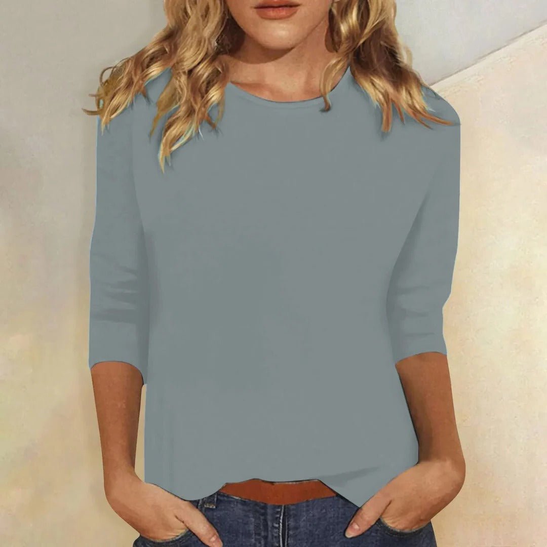 Women’s top with 3/4 sleeves, crew neckline, and regular fit, ideal for everyday wear, office outfits, and casual styling.