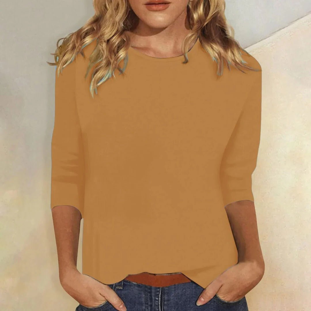 Women’s top with 3/4 sleeves, crew neckline, and regular fit, ideal for everyday wear, office outfits, and casual styling.