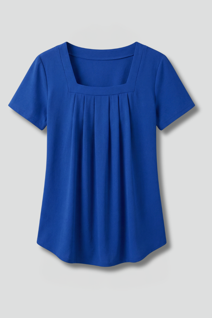 Women’s tunic top with square neckline, pleated front detail, loose fit, and hip-length hem for casual everyday styling.