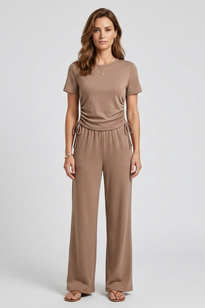 Women’s two piece set with short sleeve round neck top and wide leg trousers, ideal for casual everyday wear and travel outfits.