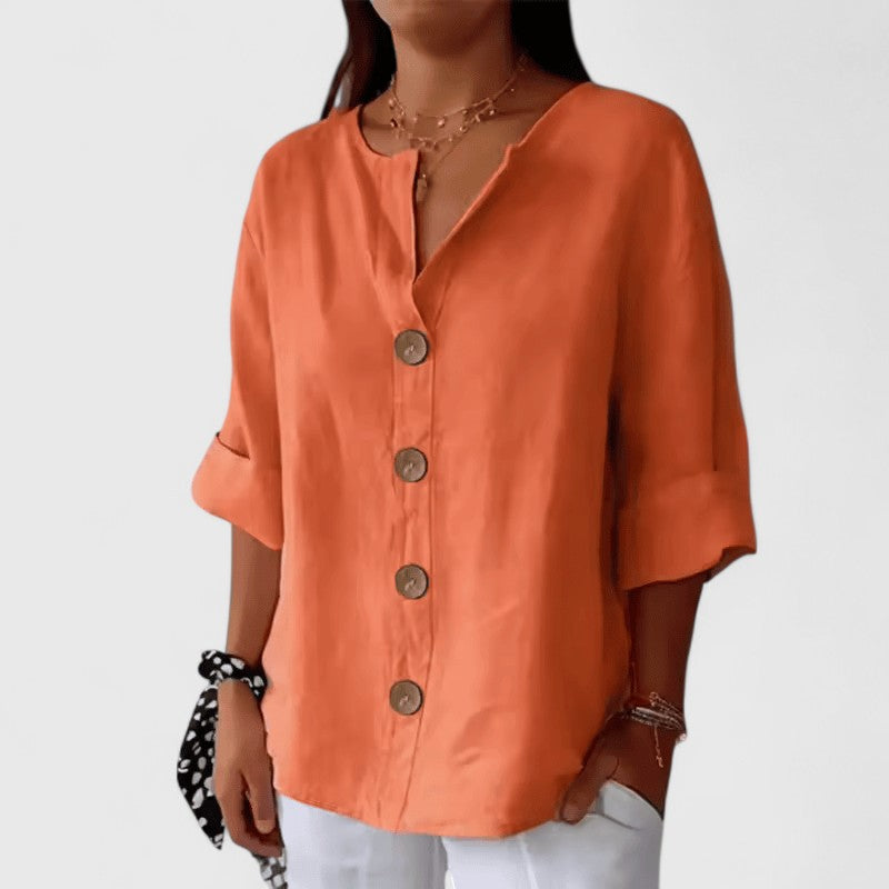 Women’s V-neck blouse with button-front detail and relaxed fit, ideal for office wear, vacations, and casual everyday styling.