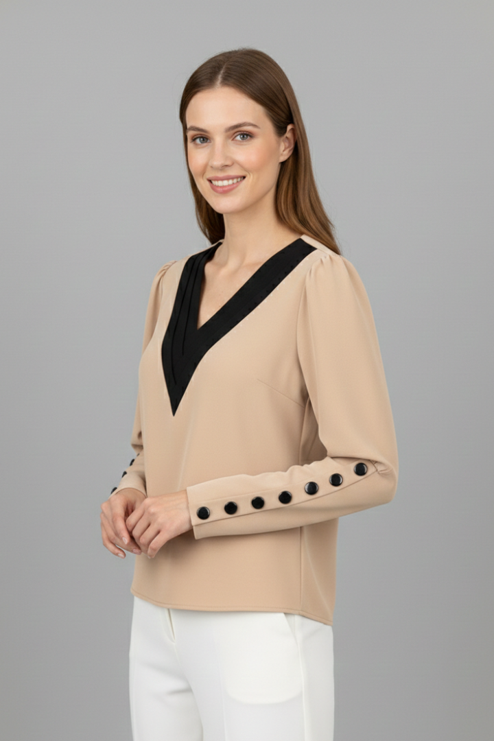 Women’s V-neck blouse with contrast trim, wrap-style front, and cuff buttons, featuring a color block design for office or everyday wear.
