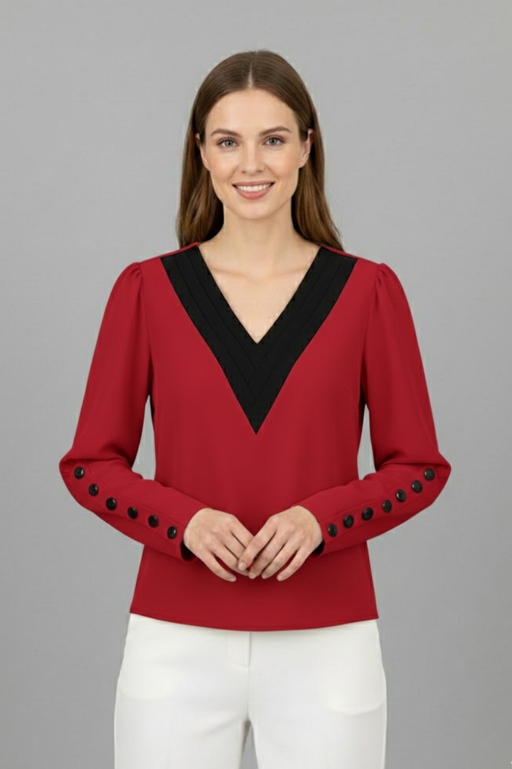 Women’s V-neck blouse with contrast trim, wrap-style front, and cuff buttons, featuring a color block design for office or everyday wear.