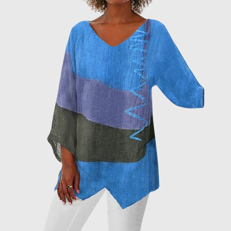 Women’s V-neck top with an artistic print and flowy fit, ideal for office wear, casual outings, and everyday styling.