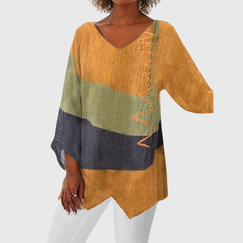 Women’s V-neck top with an artistic print and flowy fit, ideal for office wear, casual outings, and everyday styling.