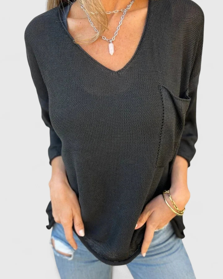 Women’s V-neck top with practical pockets and a relaxed fit, ideal for everyday wear, casual outings, and all-season styling.