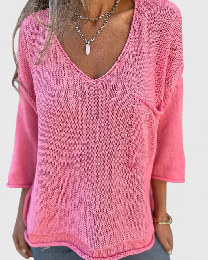 Women’s V-neck top with practical pockets and a relaxed fit, ideal for everyday wear, casual outings, and all-season styling.