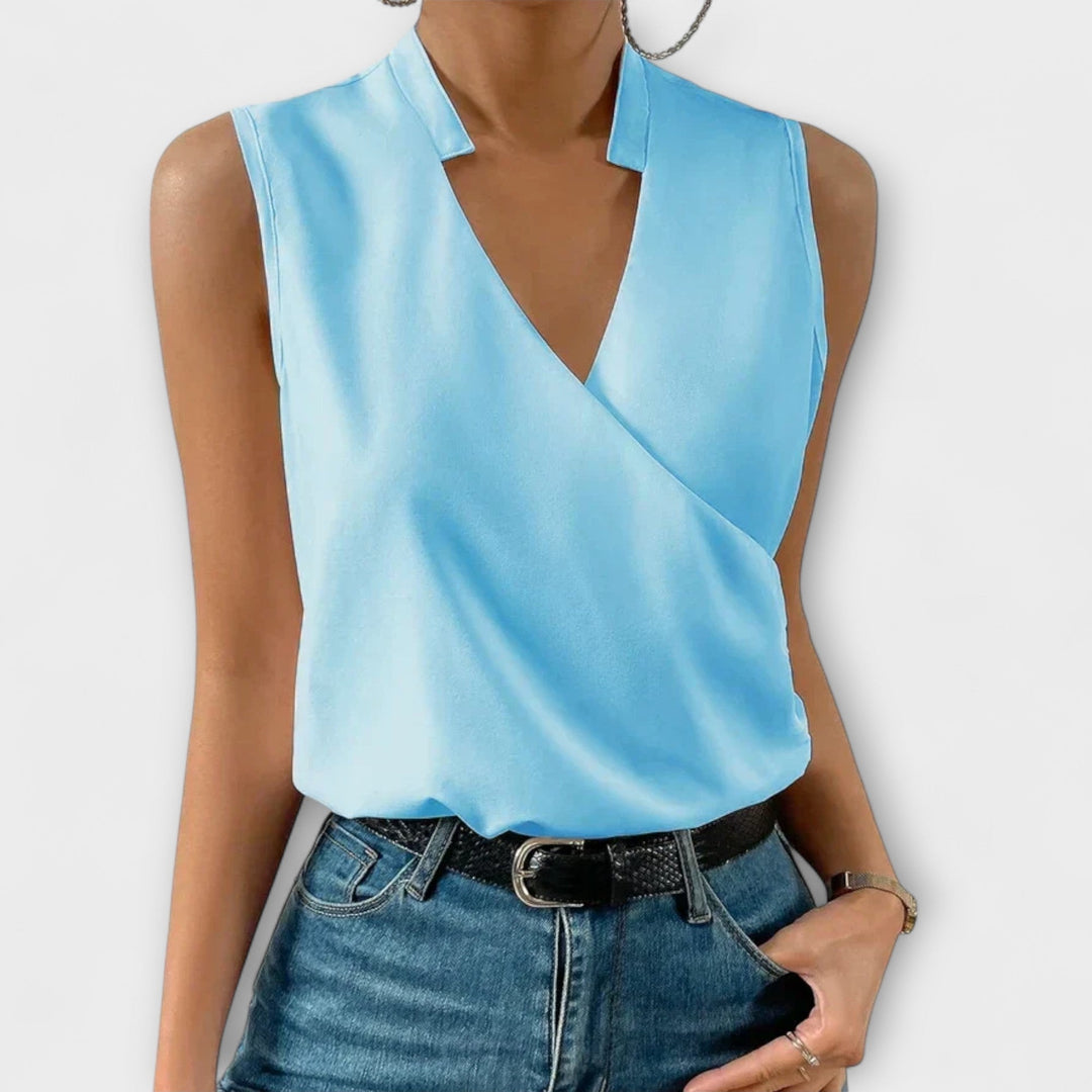 Women’s V-neck top with a relaxed fit and lightweight design, ideal for vacations, casual outings, and everyday styling.