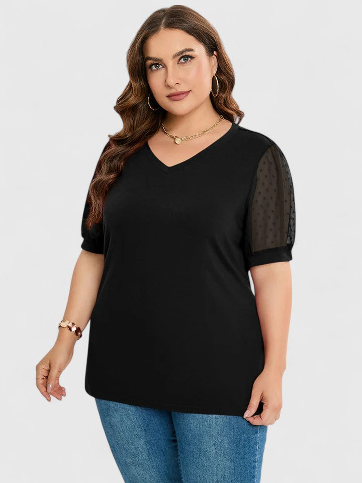 Women’s V-neck top with sheer sleeves and a flattering fit, ideal for casual wear, office outfits, and evening occasions.