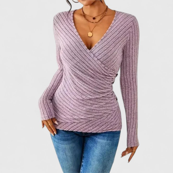 Women’s V-neck top with a tummy-tucking fit and relaxed style, ideal for casual outings, office wear, and smart-casual occasions.